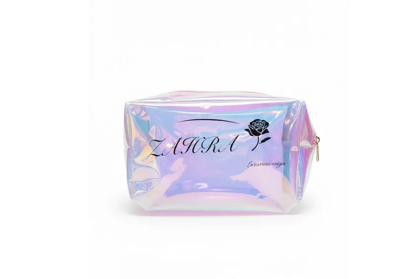 زهرة ZAHRA – حقيبة مكياج شفافة لامعة – شعار Luxurious Origin